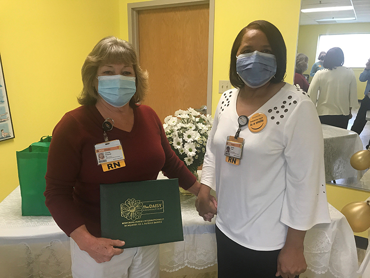 The DAISY Award for Extraordinary Nurses® winner Connie Puryear, RN, BSN, Clinical Nurse II, with colleague Alfreda Brown, RN, BSN, M. Ed, Clinical Coordinator.