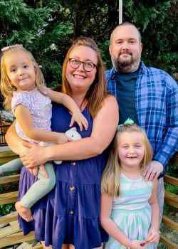 Photo of David Slemaker, his wife and two daughters