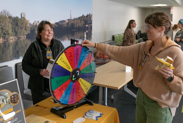 Woman spinning wheel for fun prizes