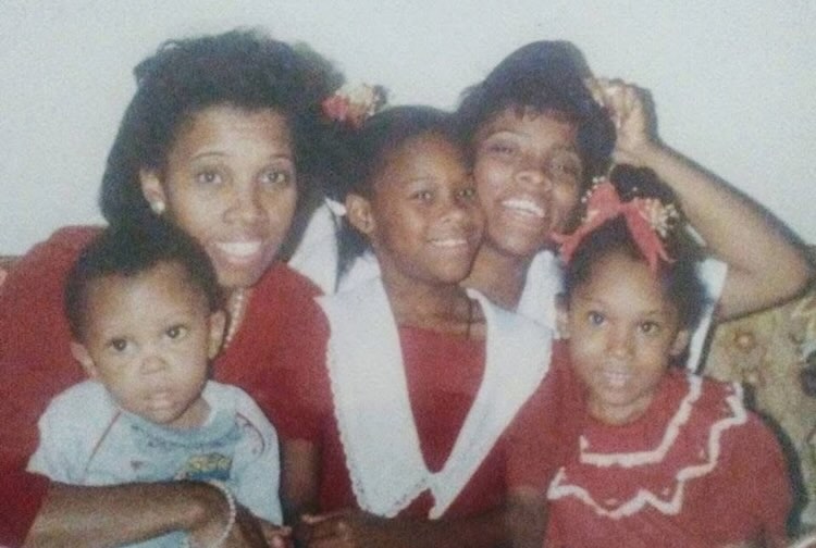 Family photo of Stephanie and Marcus growing up with their siblings and mom.