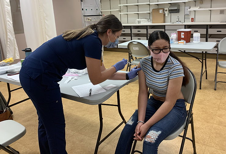 Morgan Evans, of South Hill, got her first COVID vaccine dose.