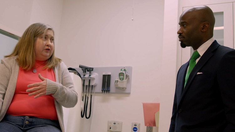 Patient speaks with her doctor.