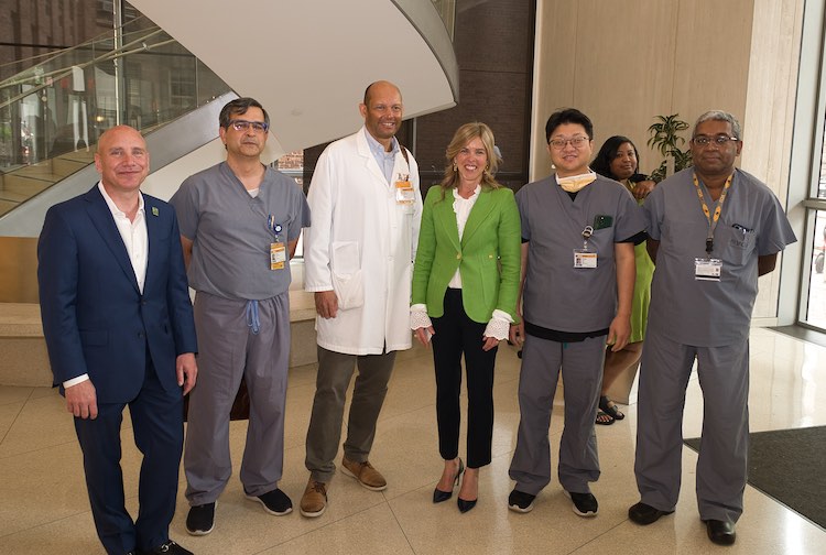 Group of Hume-Lee doctors and surgeons standing next to the First Lady of Virginia in 2023