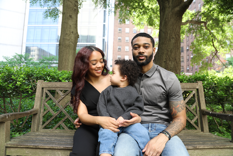 Female doctor with her husband and little boy