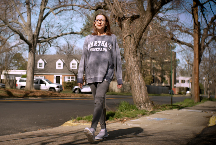 woman walking in neighborhood