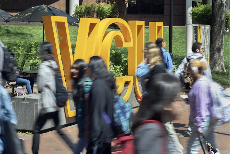 Students walking across VCU campus