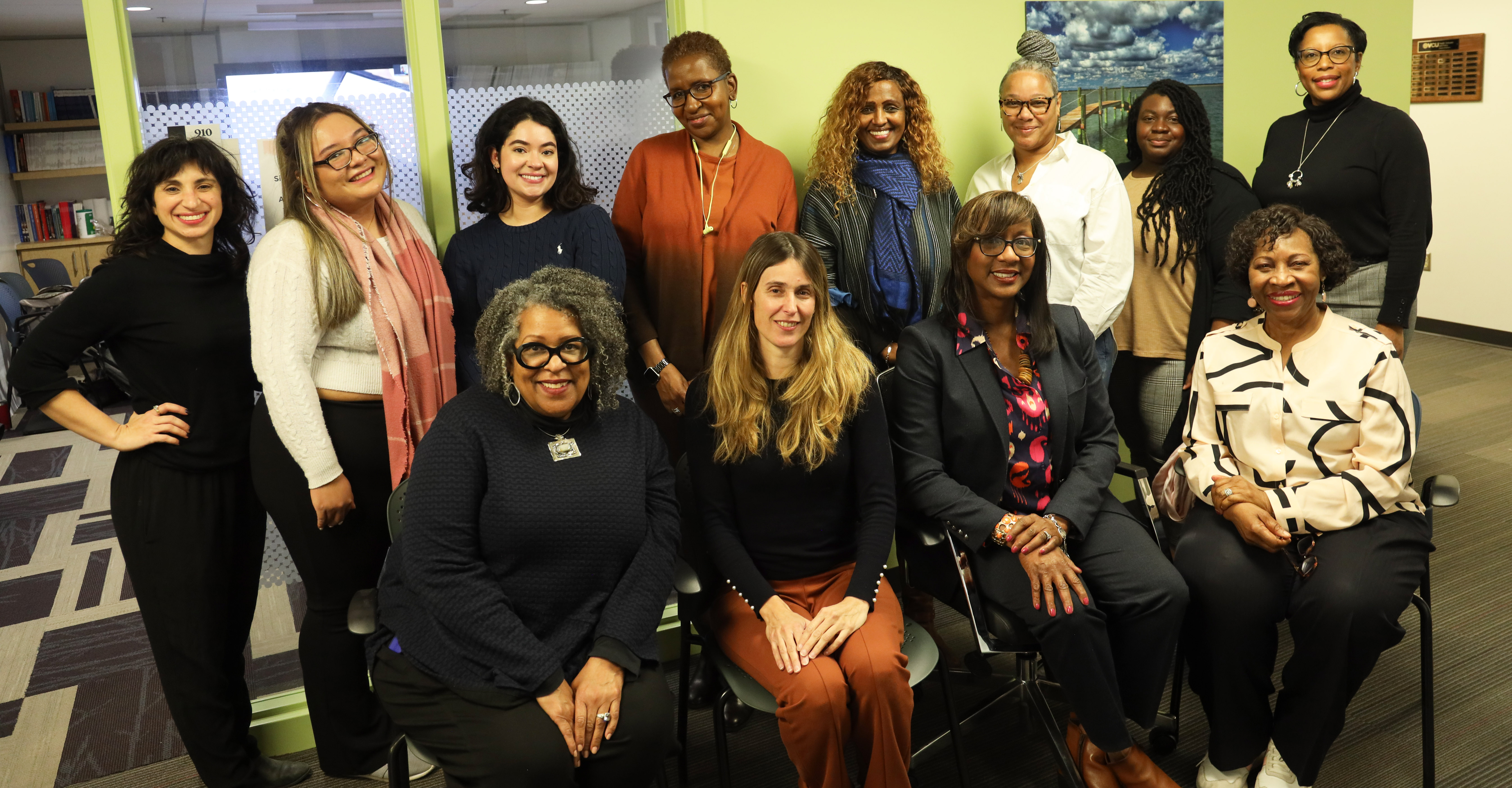 Researchers and participants from the Sisters Informing Sisters research program pose as a group.