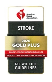 A black, white, red and gold logo that says “American Heart Association Stroke 2026 Gold Plus” and “Get with the Guidelines.”