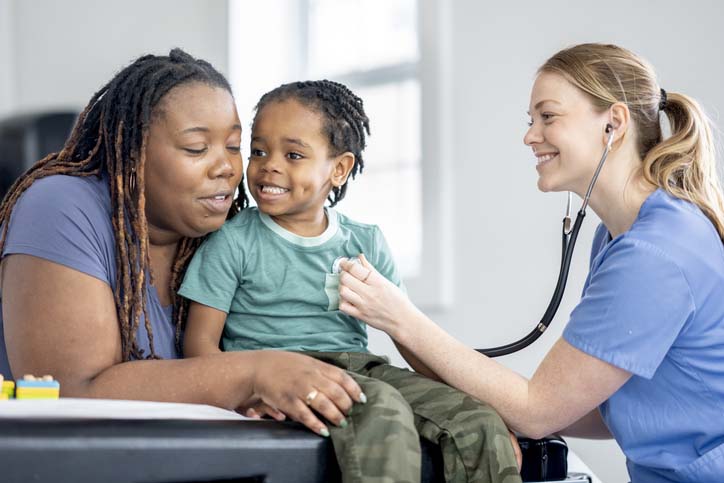 Health care provider with a parent and child