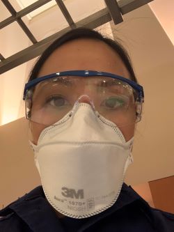 Face of Jeannette Kim wearing face mask and face shield
