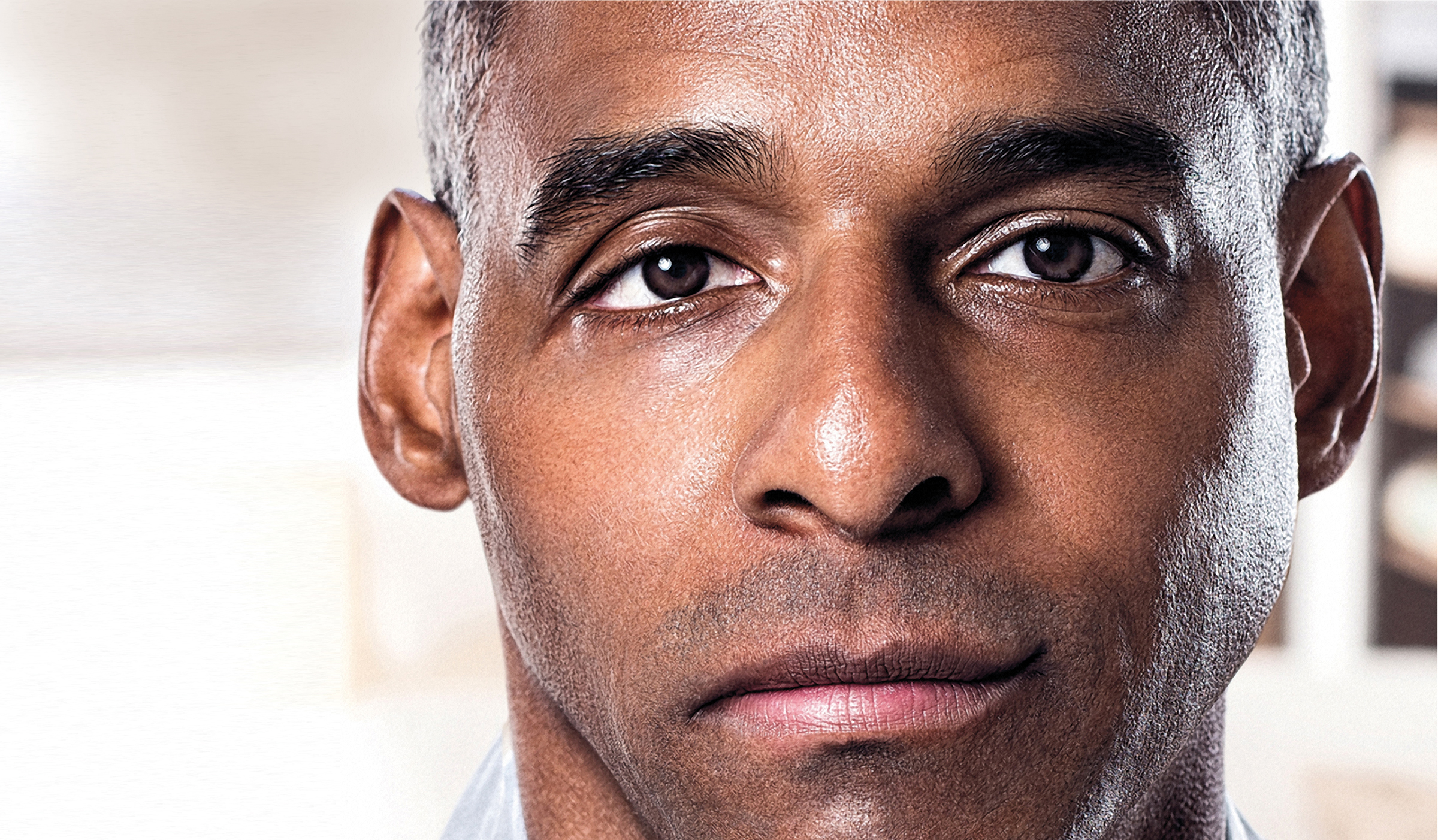 Man with face drooping on right side