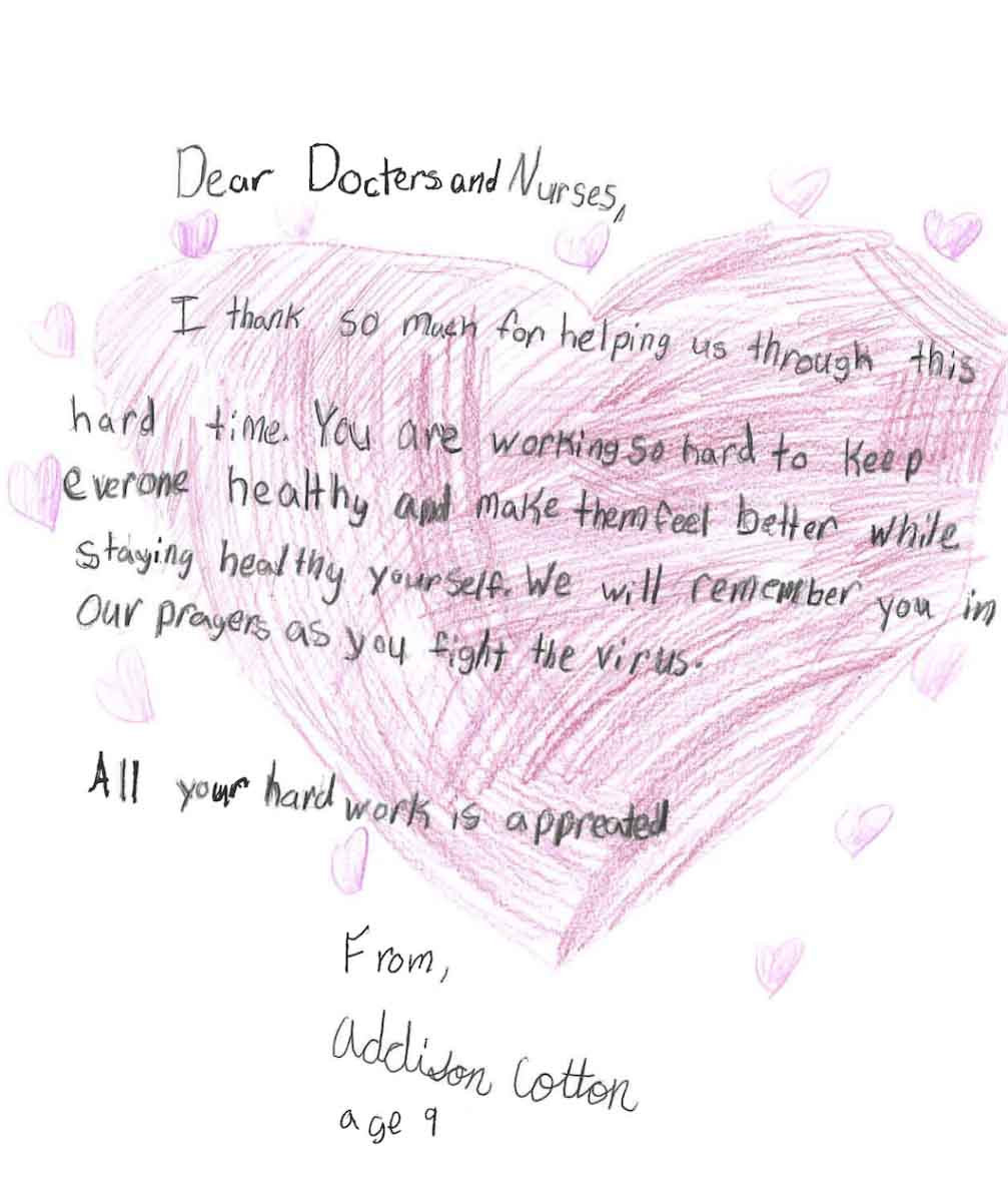 A letter with a large pink heart around the text