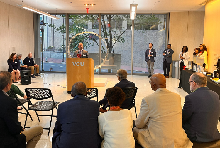 Fadi Salloum, PhD, gives the opening remarks at the first annual Pauley Pilot Symposium.