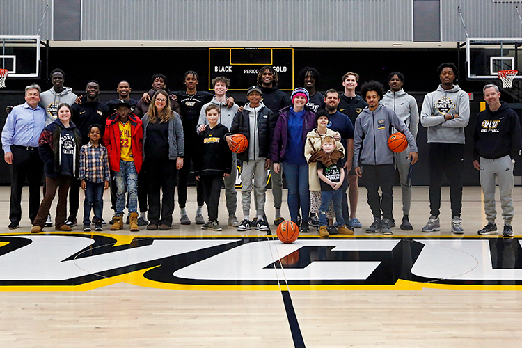 Unleashing their creativity: CHoR patients and VCU basketball players paint sneakers for a cause